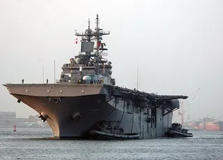 What do the People's Liberation Army think of U.S. aircraft carriers and landing attack ships?